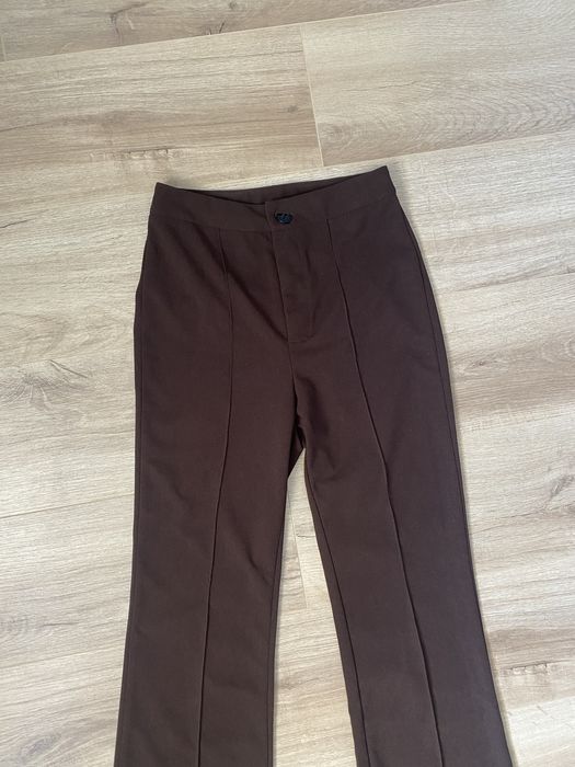 Damskie brązowe eleganckie spodnie XS dzwony