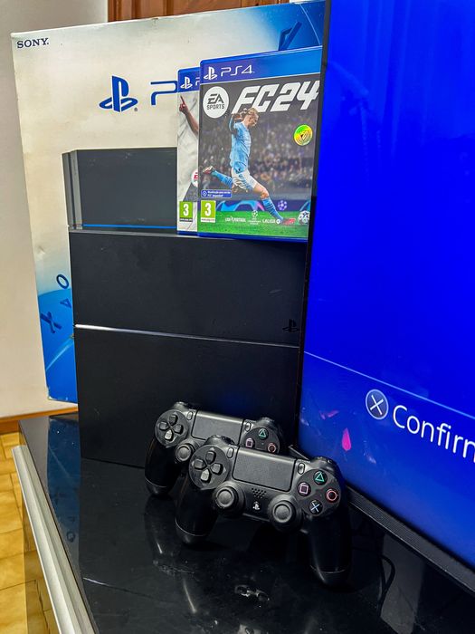 PS4 1TB com 2 comandos e jogos