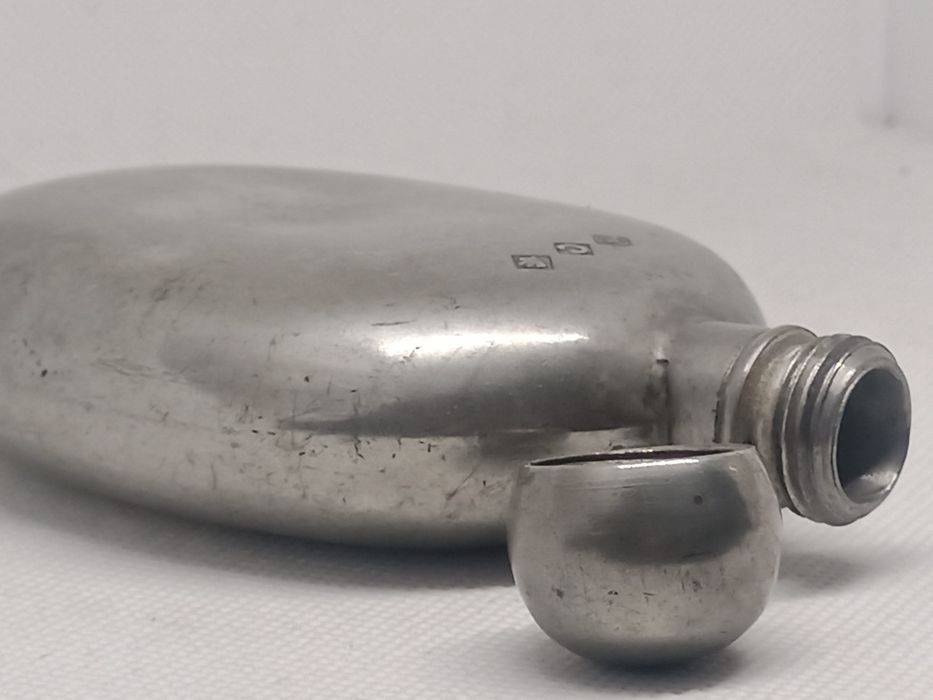 Pocket-sized metal alloy bottle