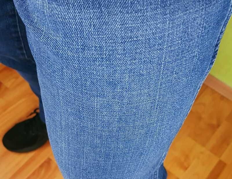 Męskie jeansy Wrangler River - True Tapered -Sundown Blue nowe W32/L34