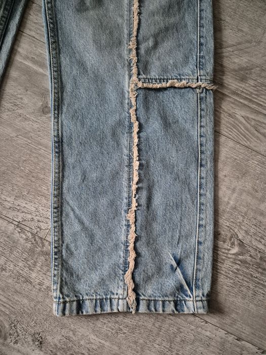 Luźne spodnie jeansy baggy Bershka M