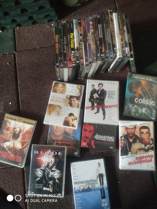 Cerca de 50 filmes DVD selados