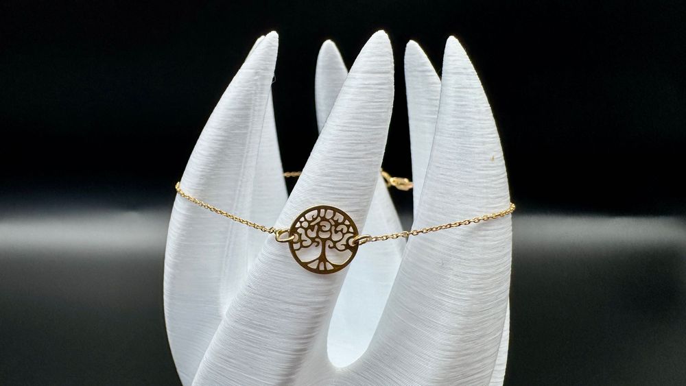 Złota bransoletka celebrytka "Drzewo życia"; próba: 14ct 585, waga: 0,75g, długość: 17-20cm