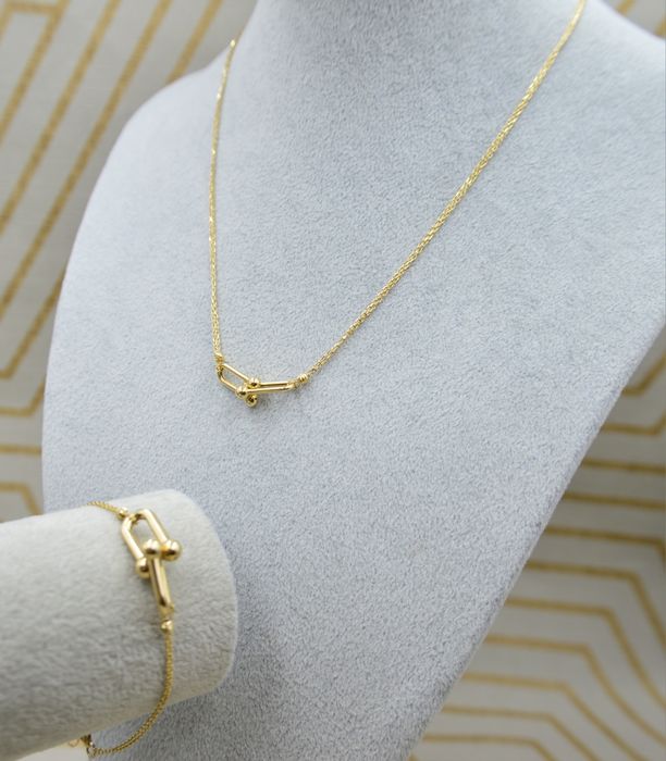 Złoty komplet biżuterii łańcuszek bransoletka na wzór Tiffany hardwear