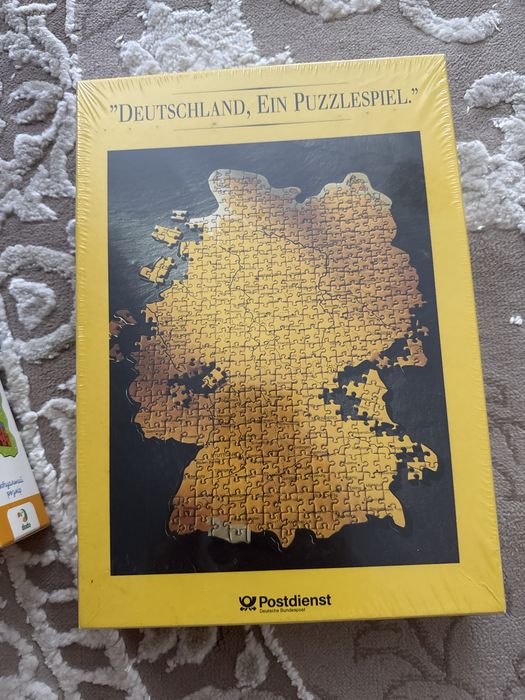 Новая  игра  пазлы запакованая карта германии