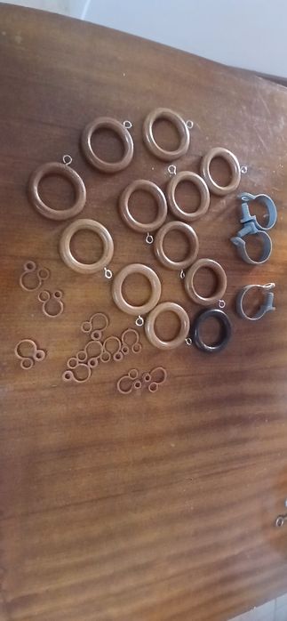 Argolas e encaixes para cortinados