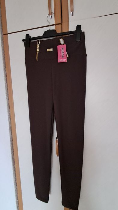 Nowe legginsy prazek firmy Fashion