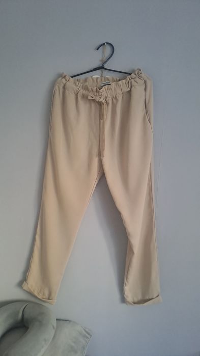 Spodnie eleganckie beżowe L/ XL