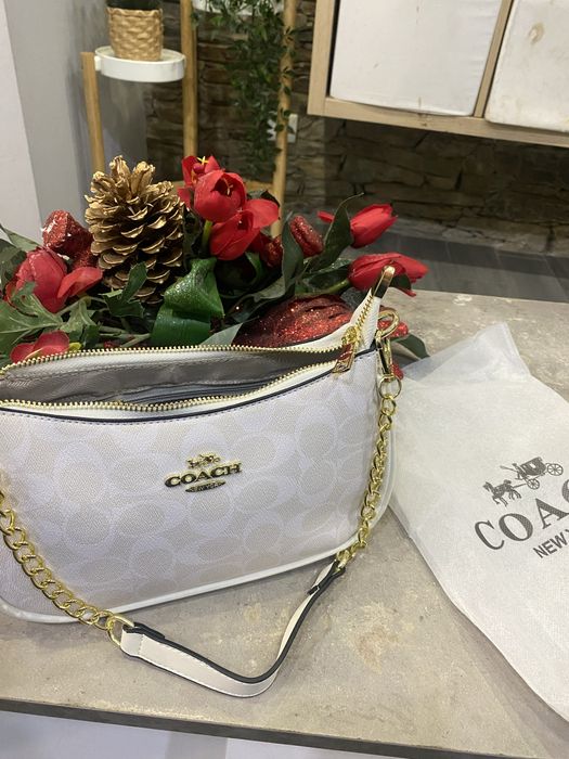 Mala senhora  coach nova muito elegante e muito bom acabamento