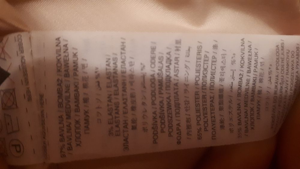 Damska, pudrowo-różowa, elegacka marynarka marki Mango