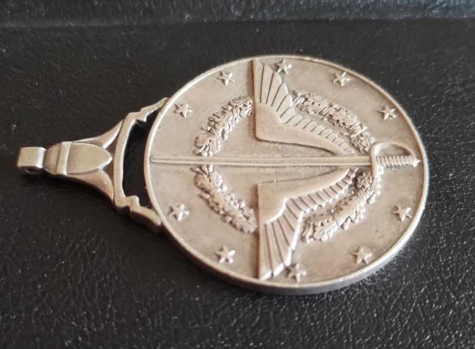 Медаль серебряная