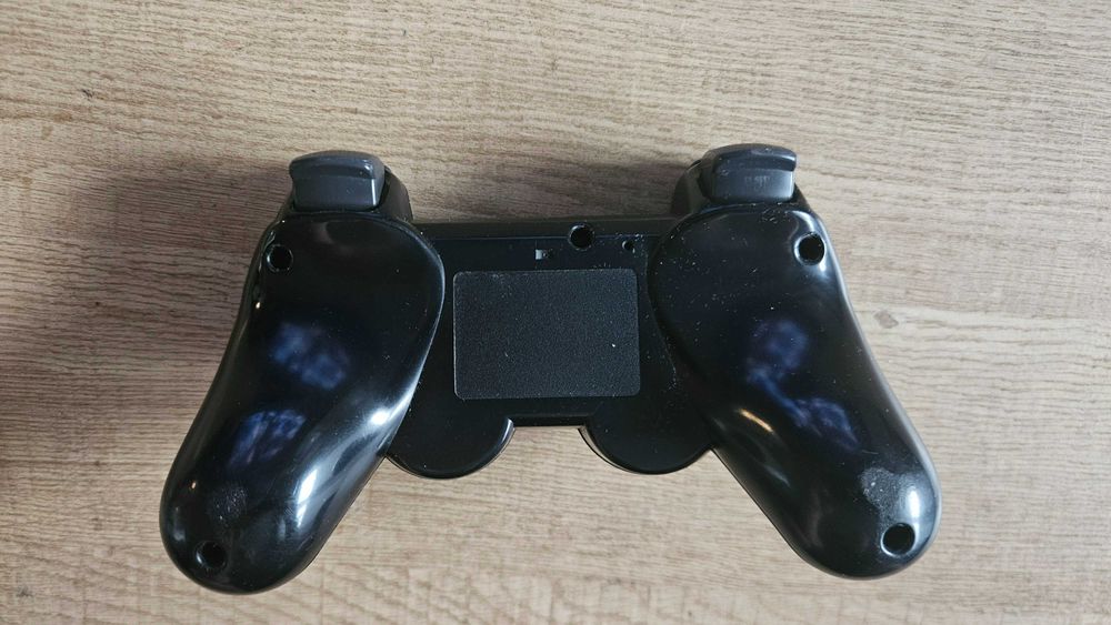 Sony PS3 Slim CECH-2004A 120GB + oryginalny DualShock 3 + 2 gry