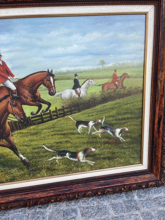 Quadro com pintura de caça com 1,15 de largura e 85 de altura.