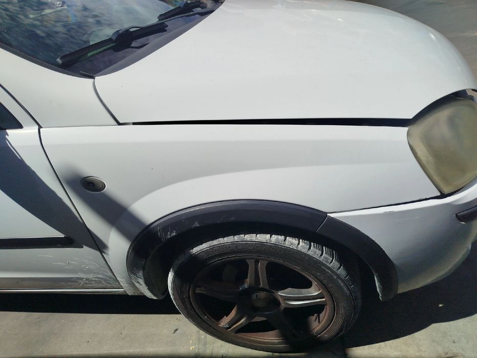 Guarda-lamas direito OPEL Corsa C
