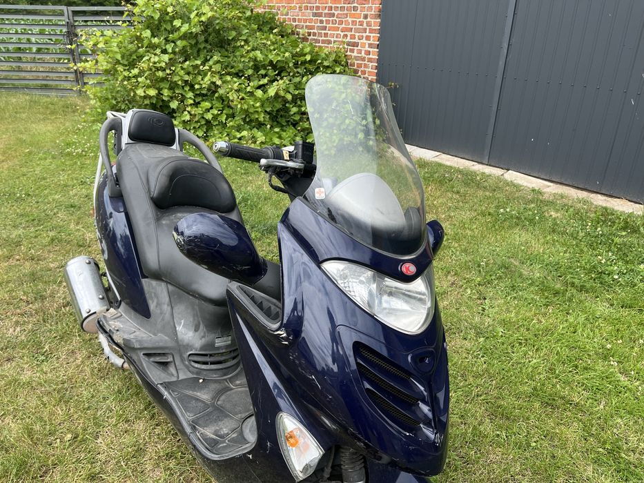 Kymco Grand Dink 125 na części czasza osłony gaźnik lusterka płozy