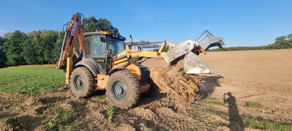 Prace ziemne koparkoładowarką*Koparka*widły