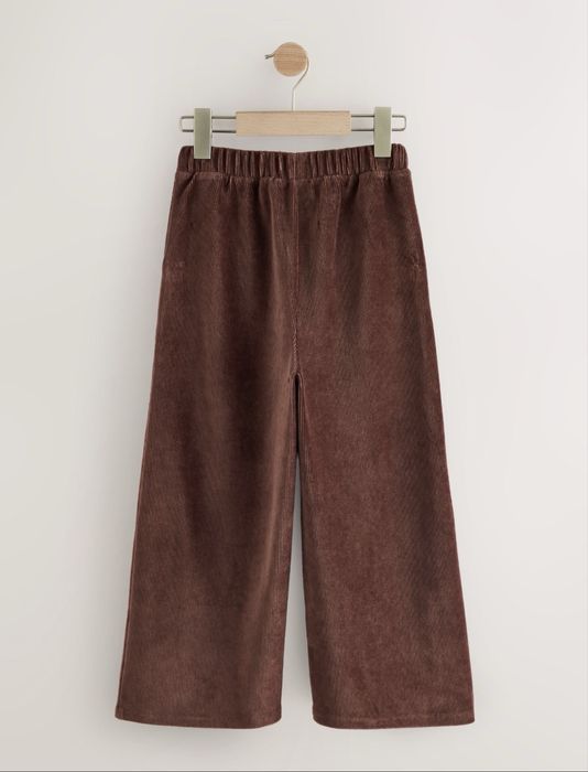 Штани вельветові на дівчинку Next р. 140