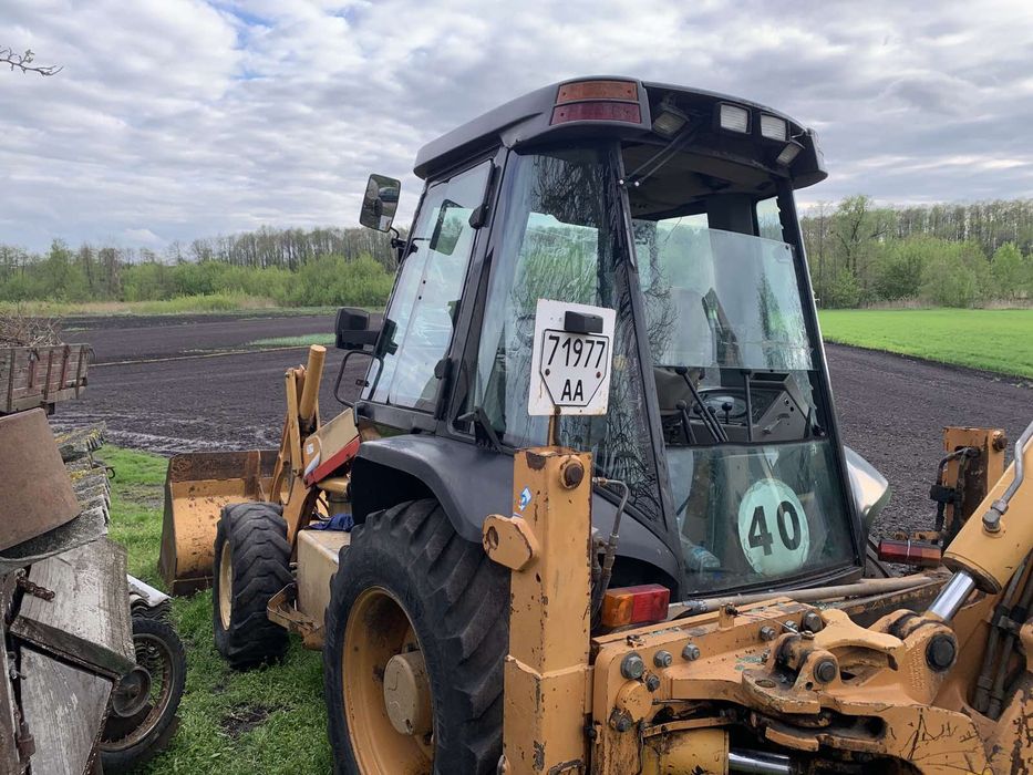 Case 580SM екскаватор навантажувач