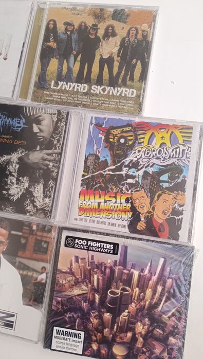 Cds selados, Aerosmith, foo fighters, lil Wayne, jay-z e outros