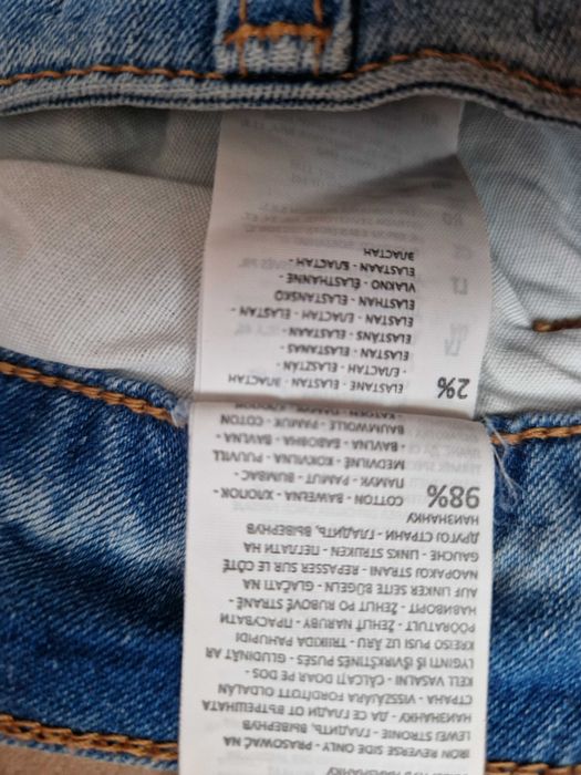 używane spodnie jeansy, dopasowuje się do sylwetki,