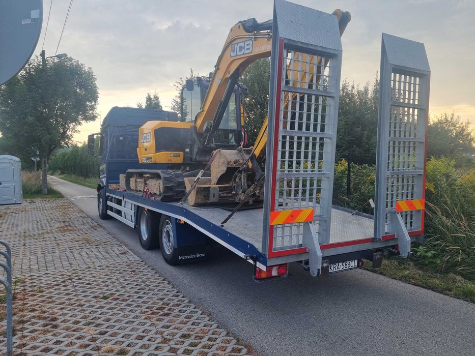 Pomoc drogowa Transport koparek maszyn samochodow