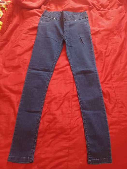 Legging-style and denim trousers in good condition.