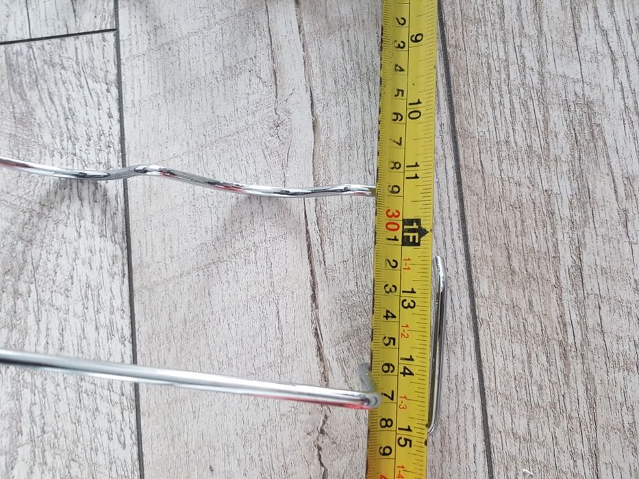 Półka metalowa na butelki do lodówki.