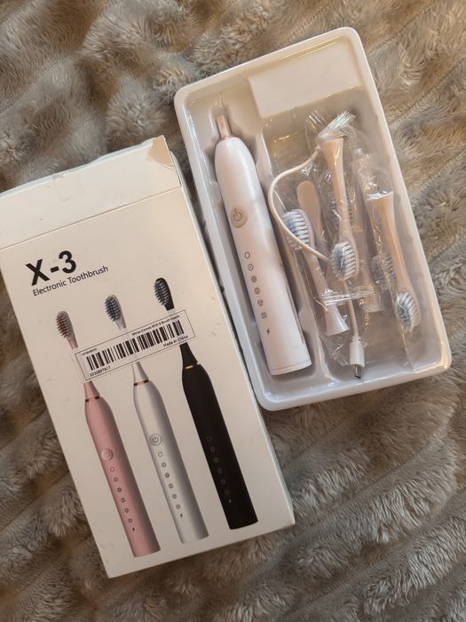 Електрична щітка