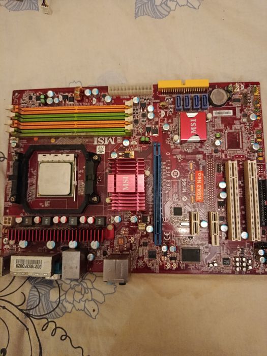 Материнські плати плата MSI K9A2 CF-F. Та ASUS J1800I-C.