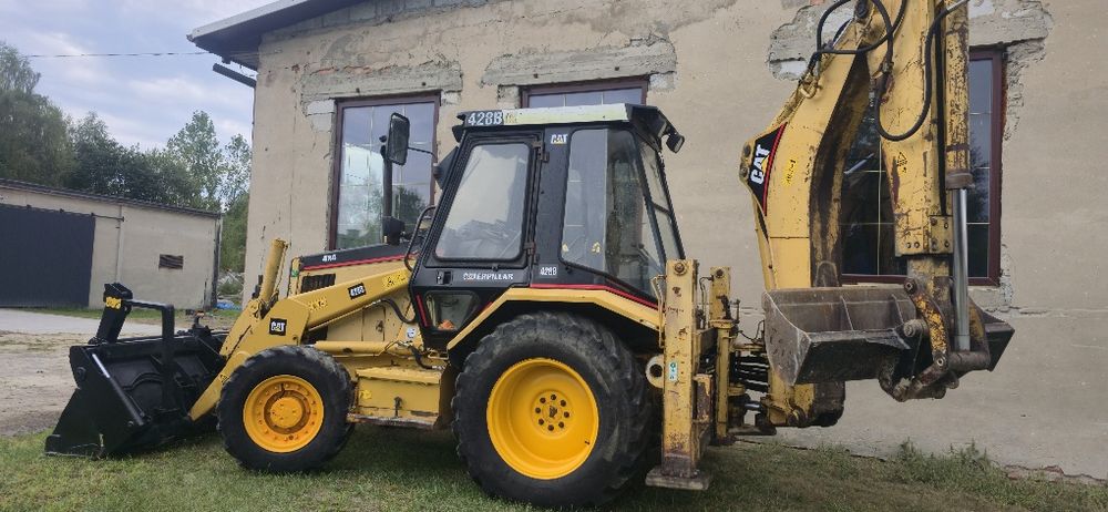 Sprzedam koparko ladowarka caterpillar cat 428b  4x4 pelna opcja