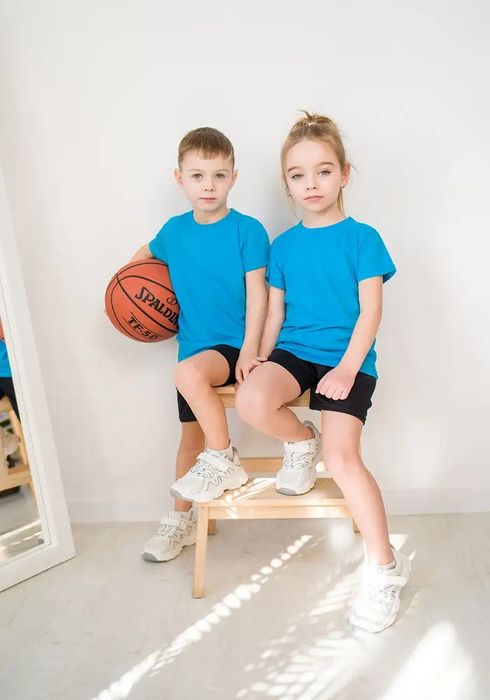 Однотонні дитячі футболки білі, жовті, сині, блакитні, кольорові