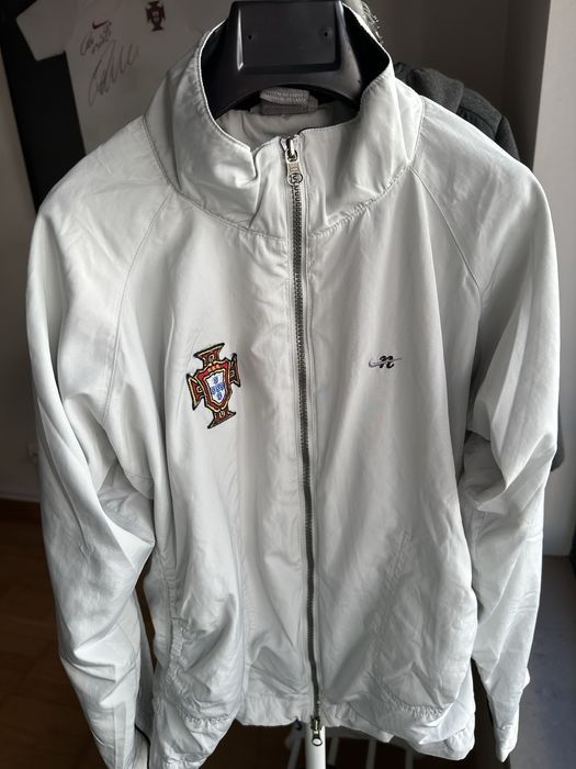 Casaco impermeável exclusivo Nike unisexo com idades 10/12 anos