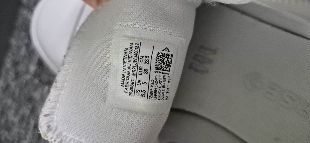 Białe skórzane trampki Converse