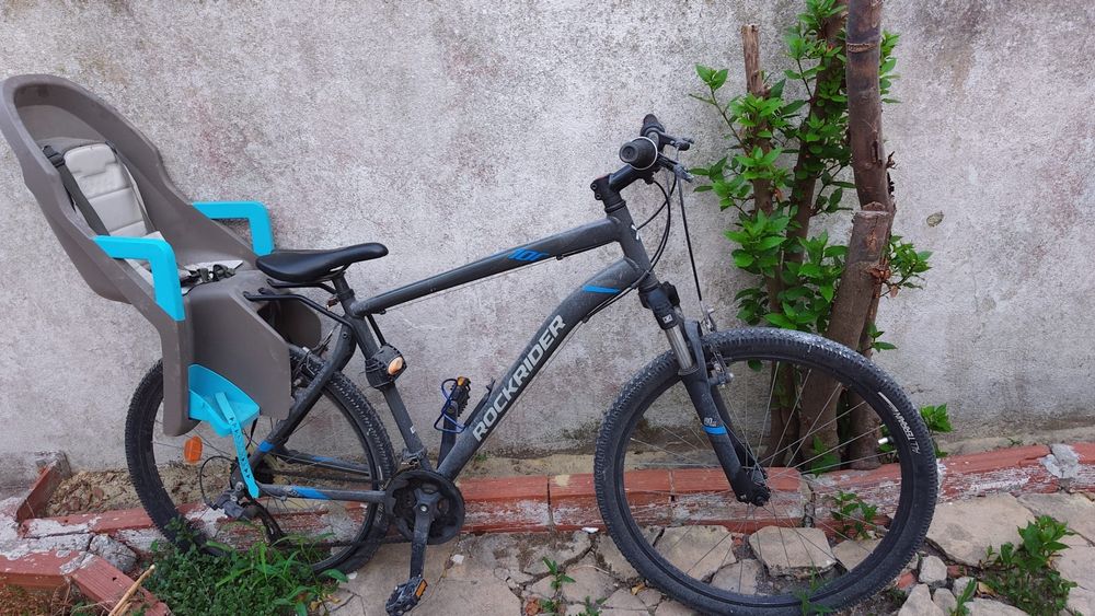 Bicicleta Rockrider com cadeira de bebe