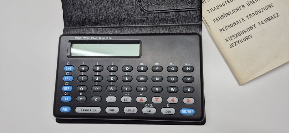 Translator kieszonkowy z lat 90tych elektroniczny