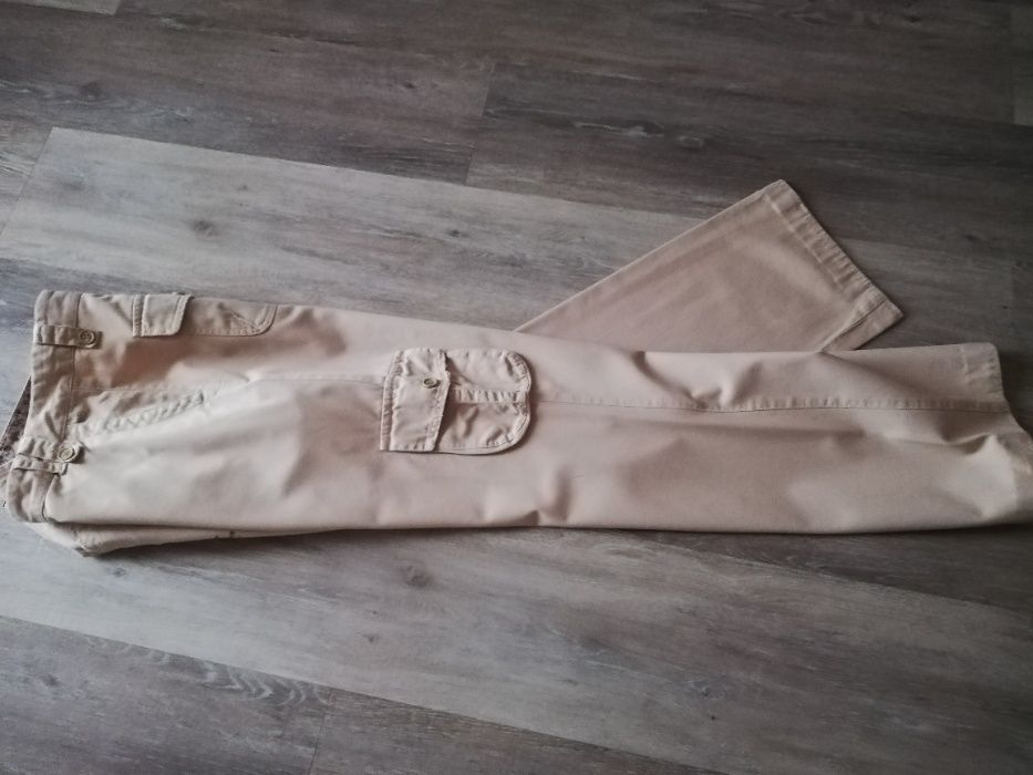 Calças Fluídas com Bolsos da marca Lion of porches