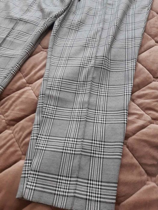 Брюки в новому стані