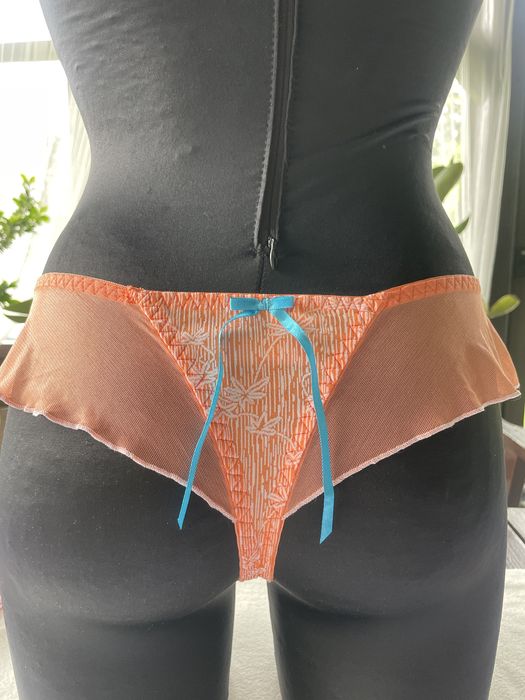 Stringi pomarańcz r.M (nowe bez metki)