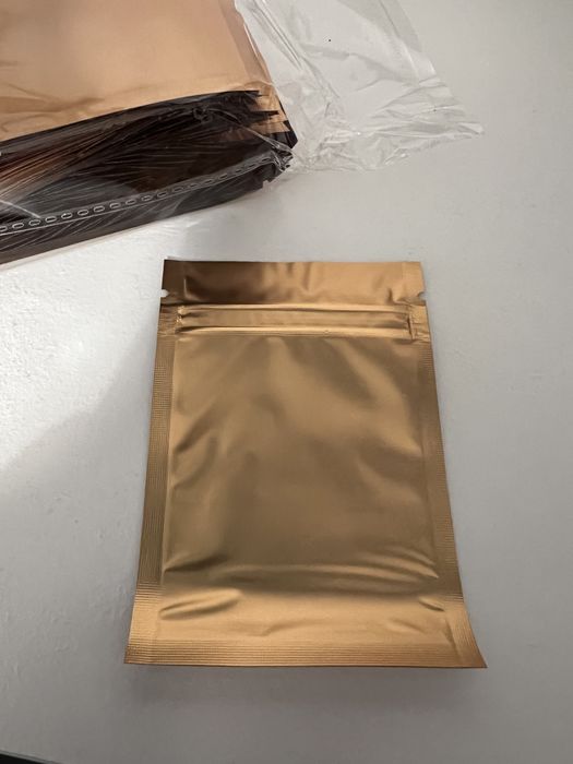 Pack 100 unidades saco opaco dourado