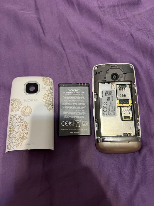 Продам сенсорный  Nokia 311 состояние отличное,рабочий