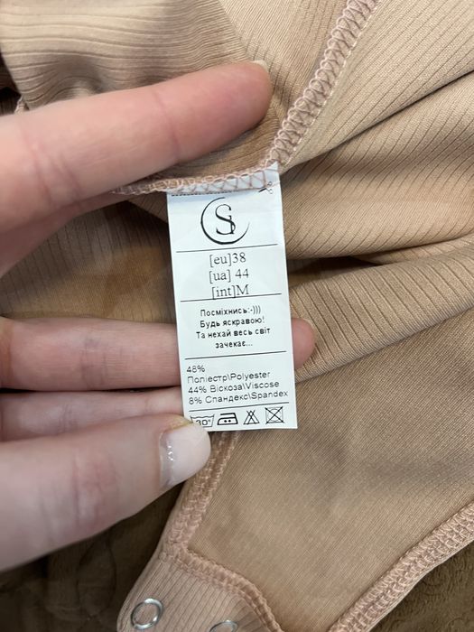 Боді в рубчик бежевого кольору