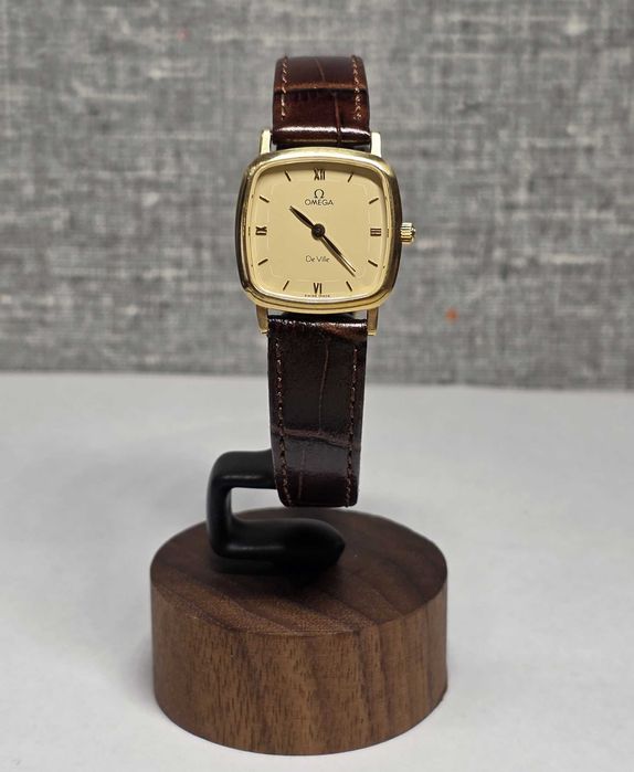 Золотий жіночий годинник Omega De Ville золото 750 пр