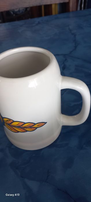 Caneca de cerveja tipo alemã.