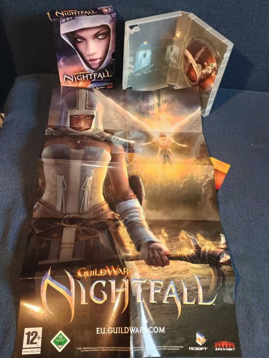 Guild Wars Nightfall z plakatem