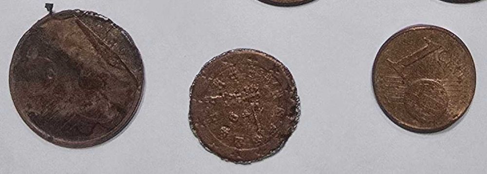 Moedas com defeito e nota