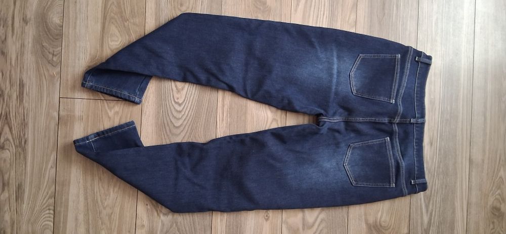 Ocieplane jensy 42/44 XL wysoki stan nowe granatowe