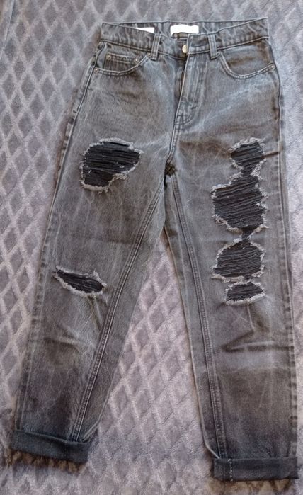 Dżinsy z dziurami XS