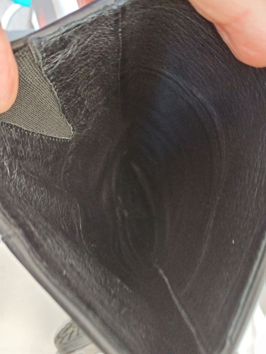 Bota cano alto em pele preta