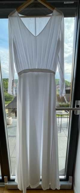 Piękna i delikatna sukienka ślubna