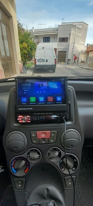 Магнітола 1Din з висувним екраном 7дюймів Windows.